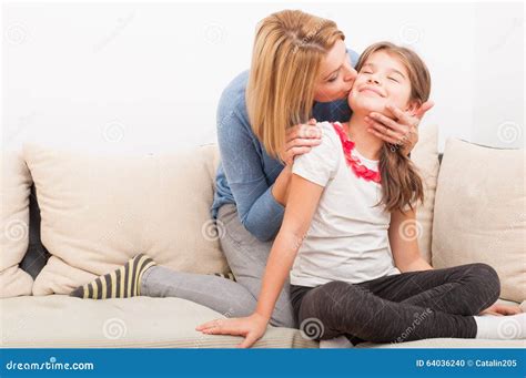 mother and daughter on casting couch|Mother Teenage Daughter Siiting On Sofa In Stock Footage.